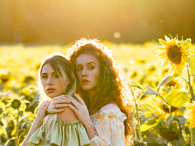 Golden hour portraits in the sunflower fields